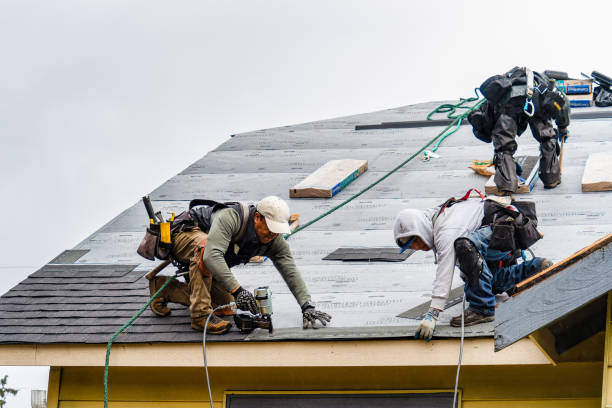 Professional Gutter Installation technician working in Fairhaven, MA